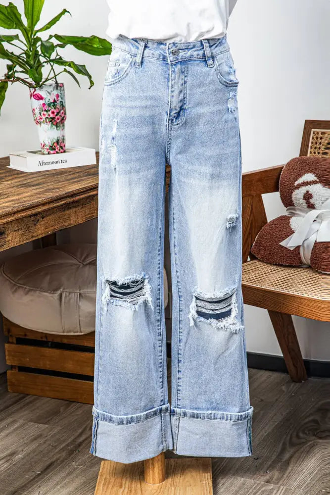 Light Wash Distressed Cuffed Flare Jeans - Posh Finds