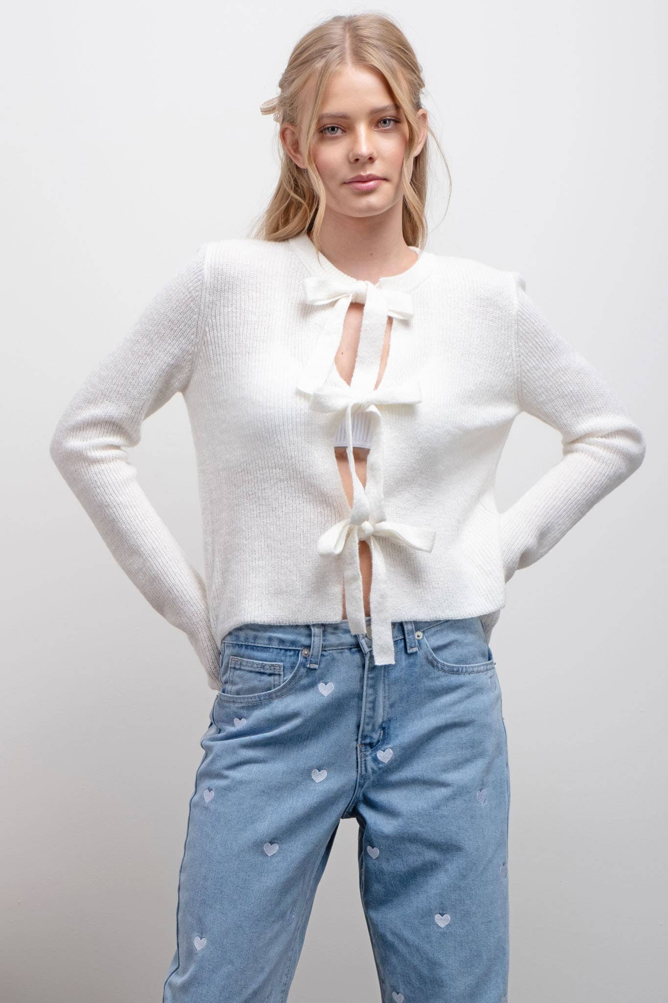 FRONT BOW DETAIL KNIT CARDIGAN: CREAM