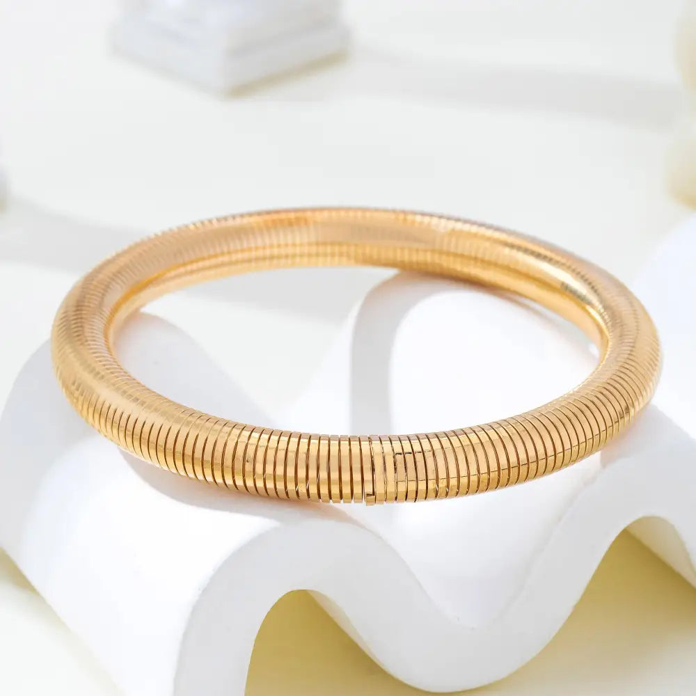 Gold-Tone Flexible Coil Bangle | 80B1714: GOLD