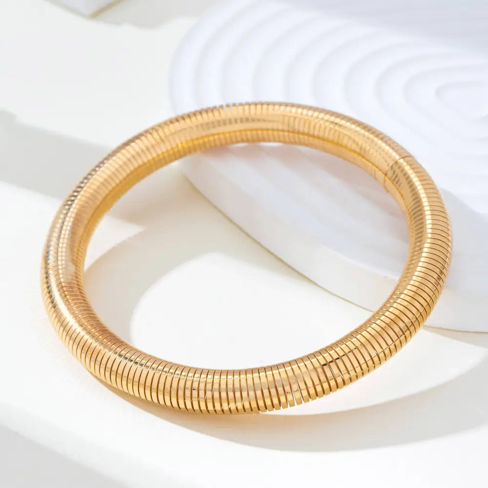 Gold-Tone Flexible Coil Bangle | 80B1714: GOLD