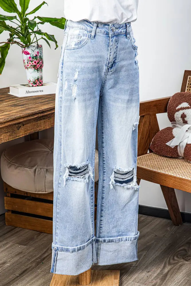Light Wash Distressed Cuffed Flare Jeans - Posh Finds